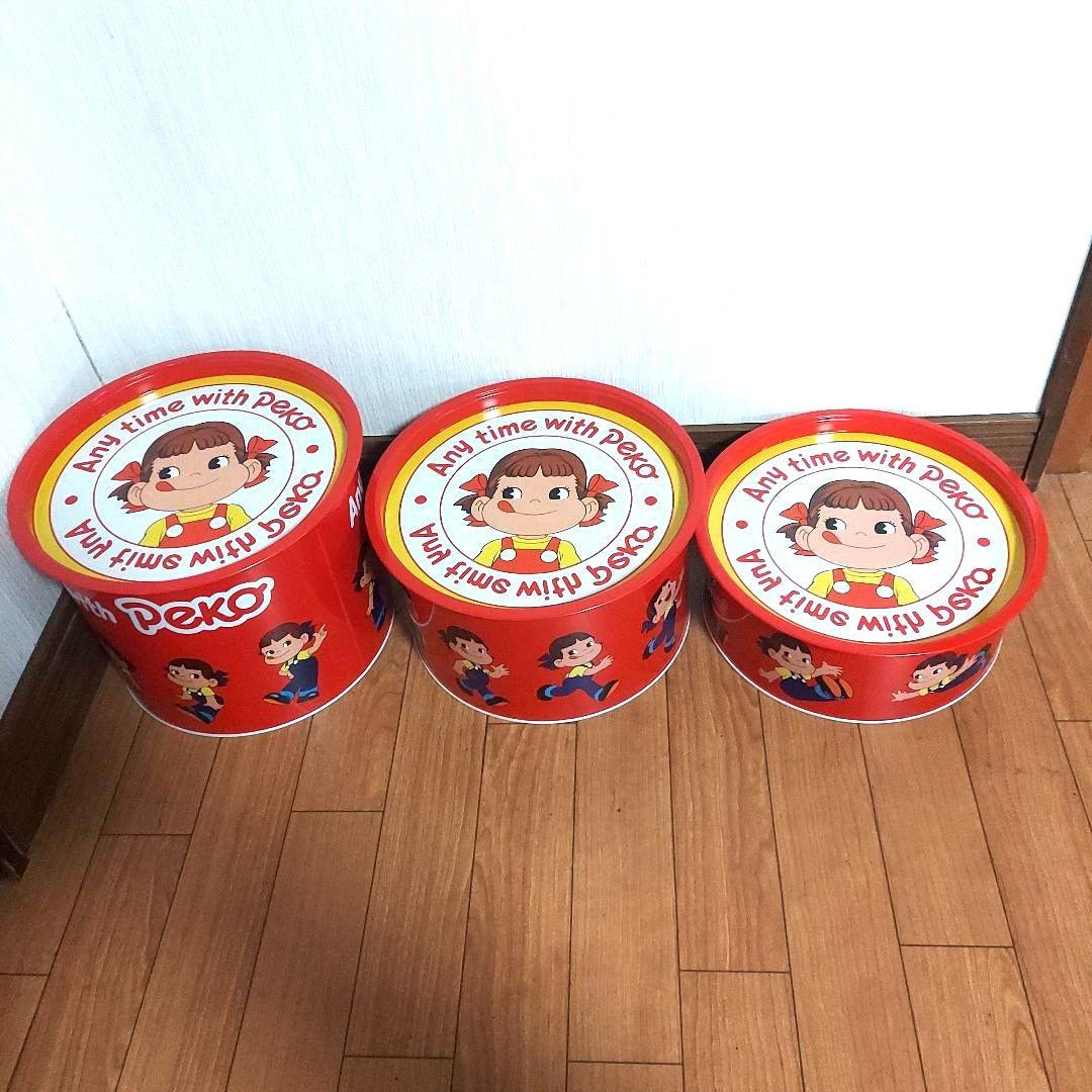 レア】不二家 ペコちゃん 3段缶セット - メルカリ