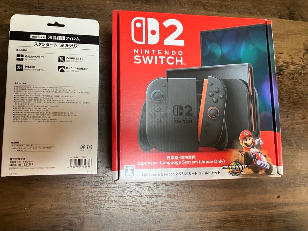 【新品】Nintendo Switch 2 本体 グレー　マリオカート Amazon.co.jp: Nintendo Switch 2(日本語・国内専用) マリオカート
