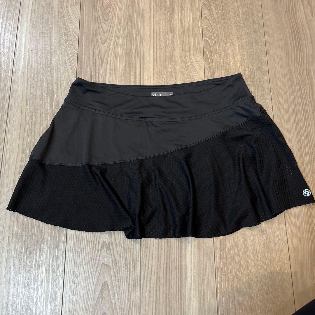 【美品】Lija リージャ　ブラックフリルテニススカート 脚を長くキレイに魅せるスコート | テニスウェア・レディース専門店